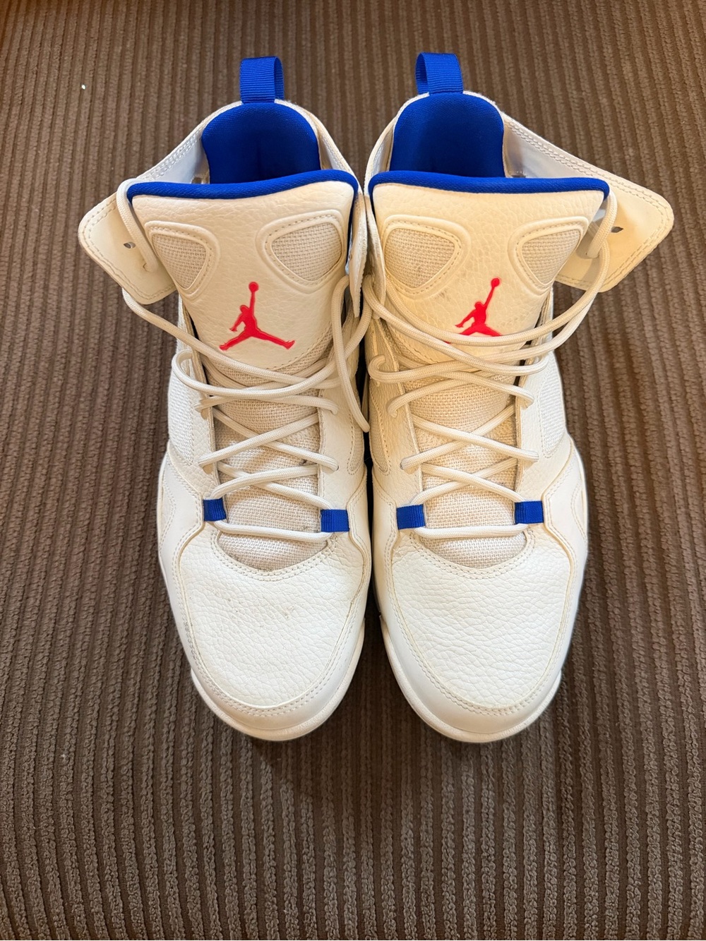 Jordan High-Top Sneakers in White with Blue and Red Accents